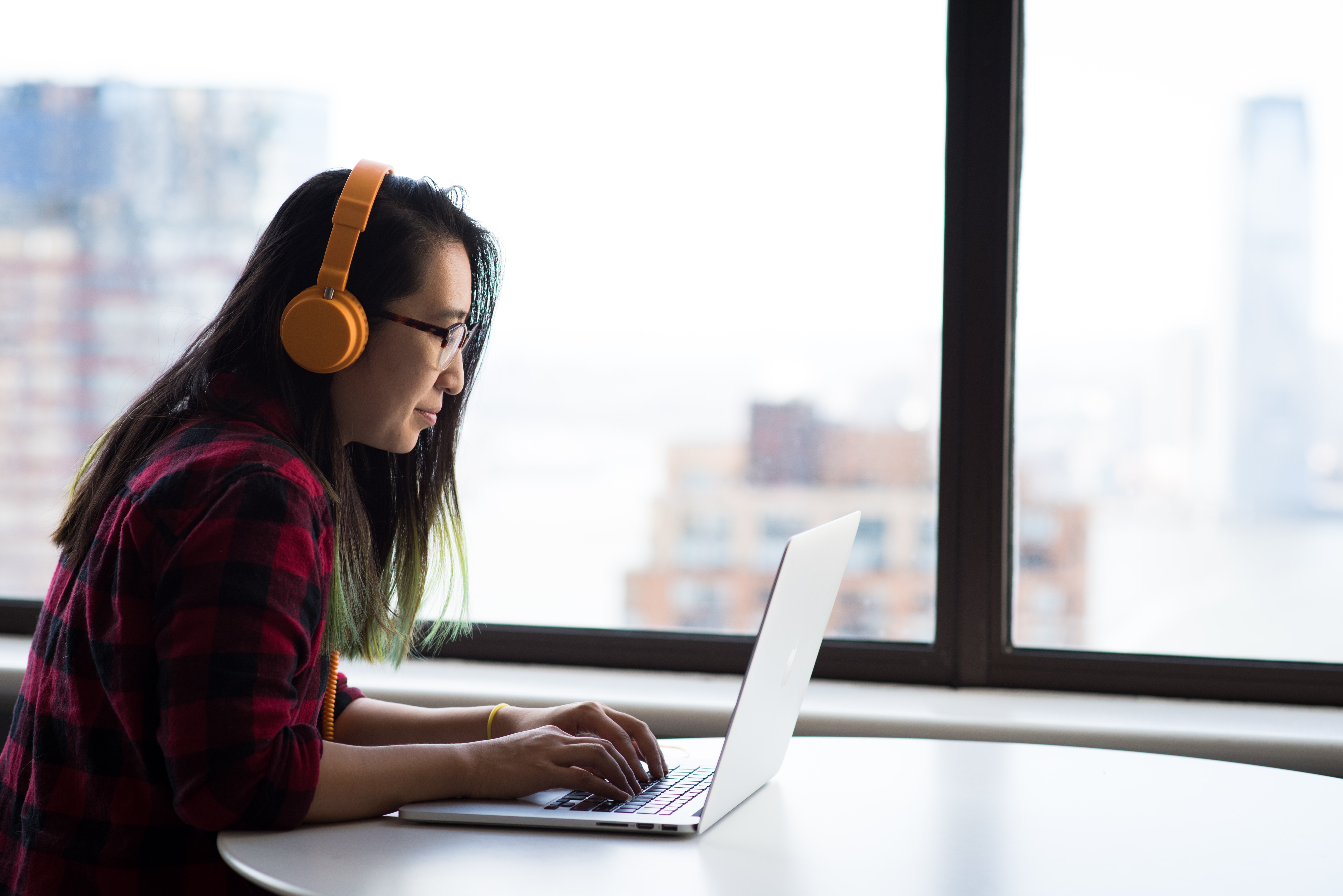 A student working on her laptop